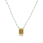 Collier cordon pierres plaque astres et pampilles -