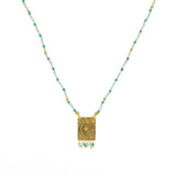 Collier cordon pierres plaque astres et pampilles -