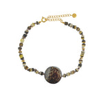Bracelet de cheville doré et coquillages