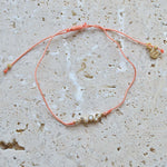Bracelet tressé et zircons blancs