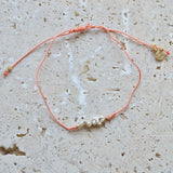 Bracelet tressé et zircons blancs