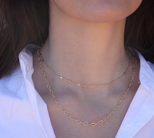 Collier doré maille détails coeurs