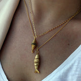 Collier doré talisman zircons