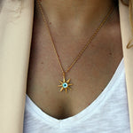 Collier doré étoile et oeil en nacre