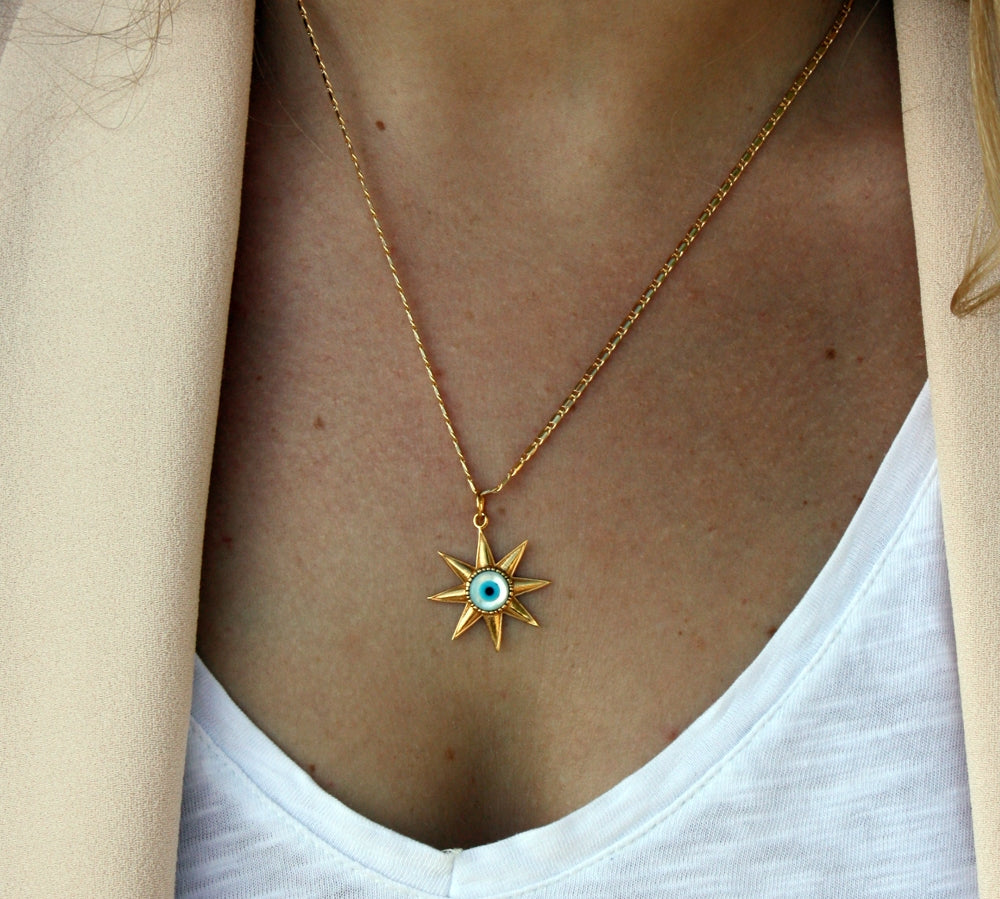 Collier doré étoile et oeil en nacre