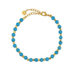 Bracelet perles dorées et pierres facettées
