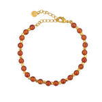 Bracelet perles dorées et pierres facettées