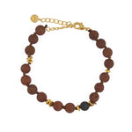 Bracelet doré perles roche volcanique et disques dorés