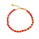 Bracelet agates rouges facettées et disques dorés