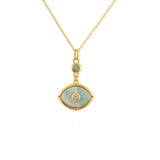 Collier doré oeil pierre et zircons