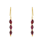 Boucles dorées et pierre en losange