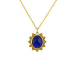 Collier doré pendentif soleil pierre facettée et zircons -