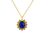 Collier doré pendentif soleil pierre facettée et zircons -