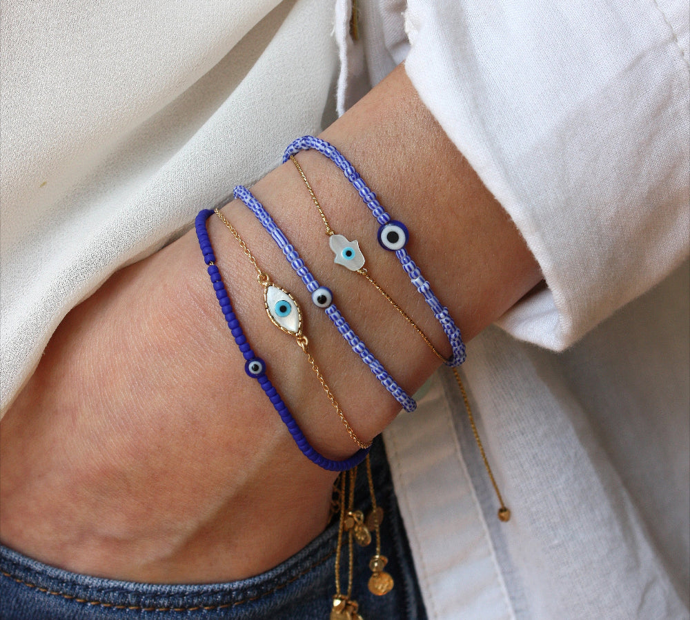 Bracelet tressé doré et main de fatma