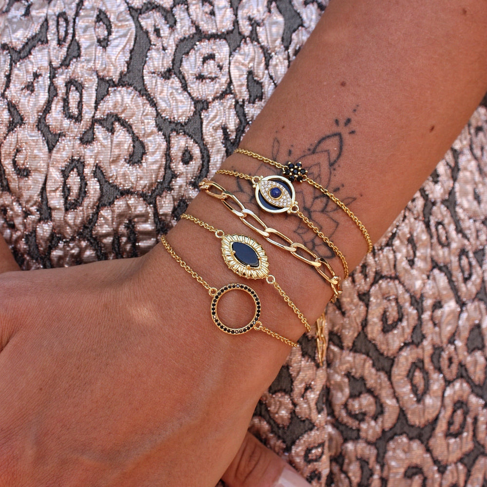 Bracelet doré oeil strié et pierre