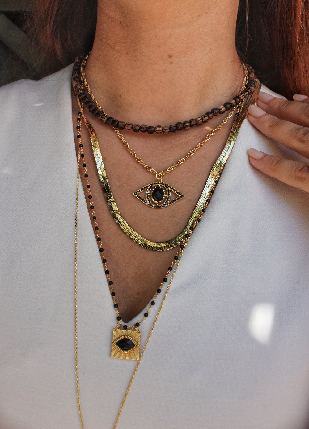 Collier perles bois moucheté