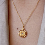 Collier doré médaille pivotante coeur pierre good karma