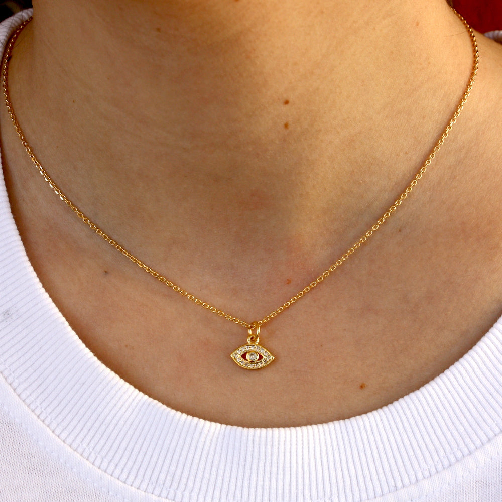 Collier petit oeil doré et zircons blancs