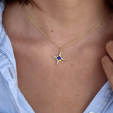 Collier doré pendentif rose des vents pierre et zircons -
