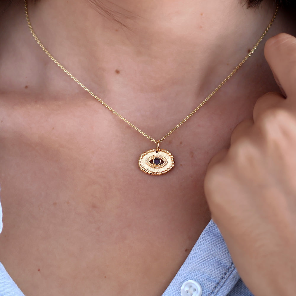 Collier doré pendentif oeil martelé et pierre - Colliers