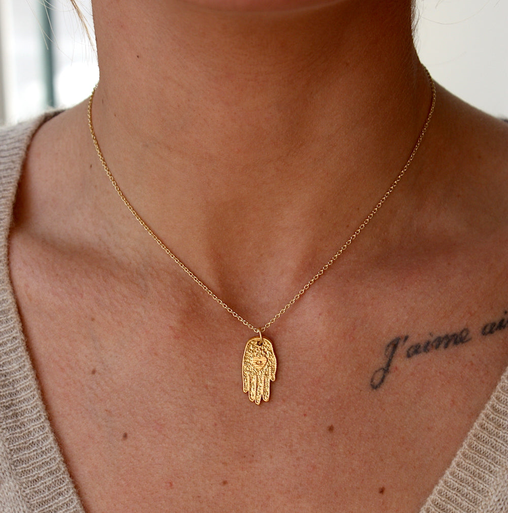 Collier doré main de fatma coeur