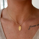 Collier doré main de fatma coeur
