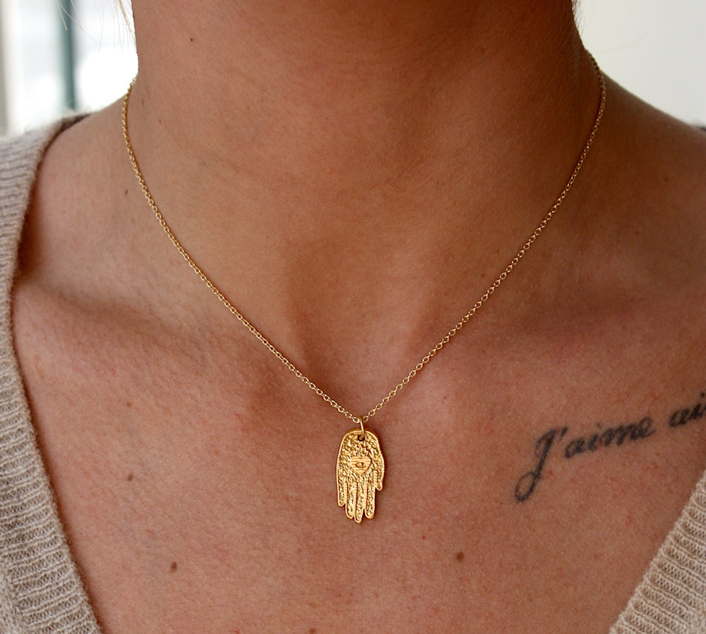Collier doré main de fatma coeur