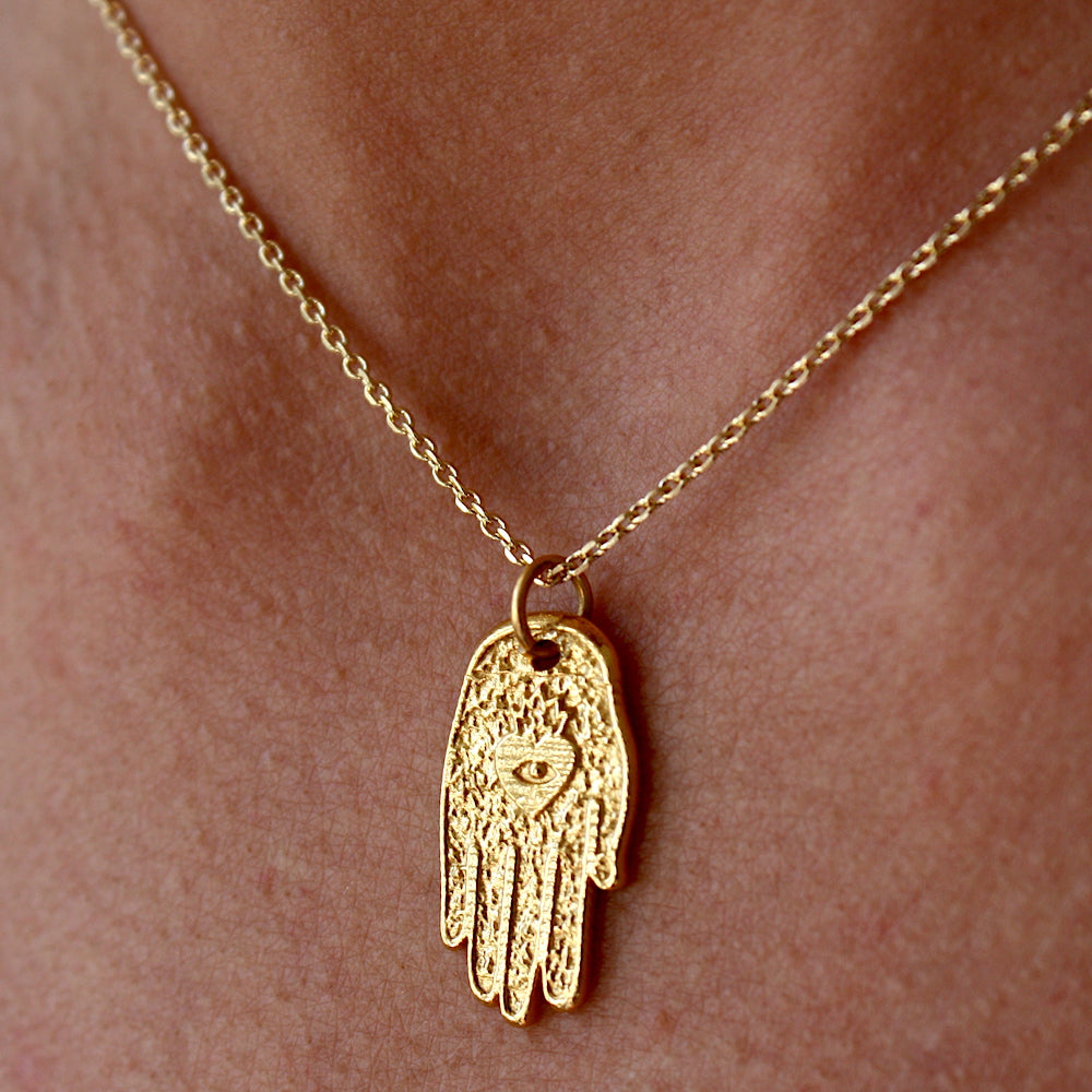Collier doré main de fatma coeur