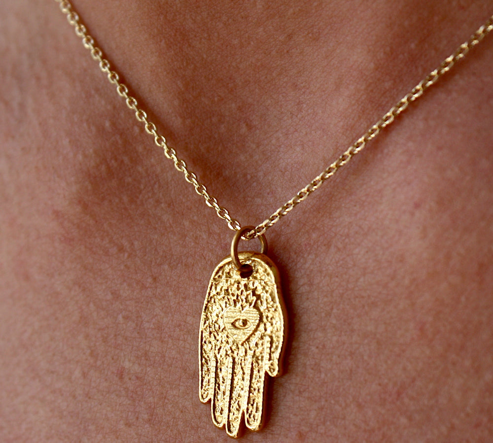 Collier doré main de fatma coeur