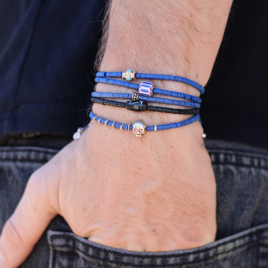 Bracelet vinyle bleu marine et perle chevron