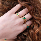 Thin gold ring with small stone