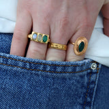 Oval gold ring and natural stone