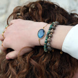 Bracelet with wooden beads and gold beads