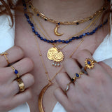 Collier doré pendentif astres