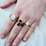 Golden ring with trio of stones