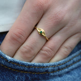 Small textured eye and stone gold ring