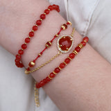 Bracelet with golden beads and faceted stones