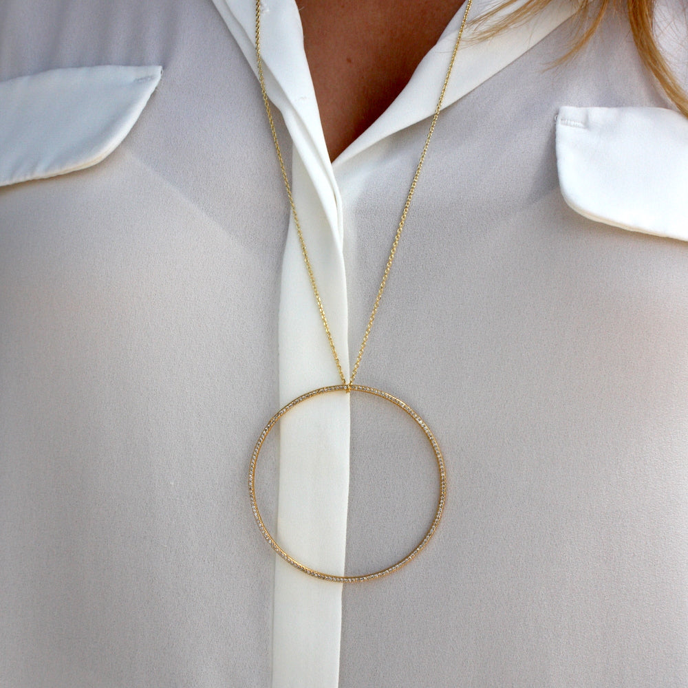 Collier doré anneau S M L XL et zircons blancs