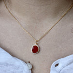 Collier doré onyx rouge et zircons blancs