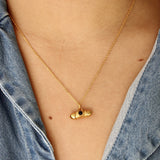 Collier doré talisman oeil soleil et pierre - ONYX NOIRE