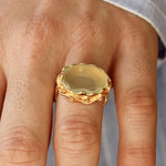 Bague dorée XXL et piere ovale
