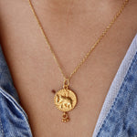 Collier doré médaille éléphant