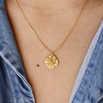 Collier doré médaille étoile et zircons