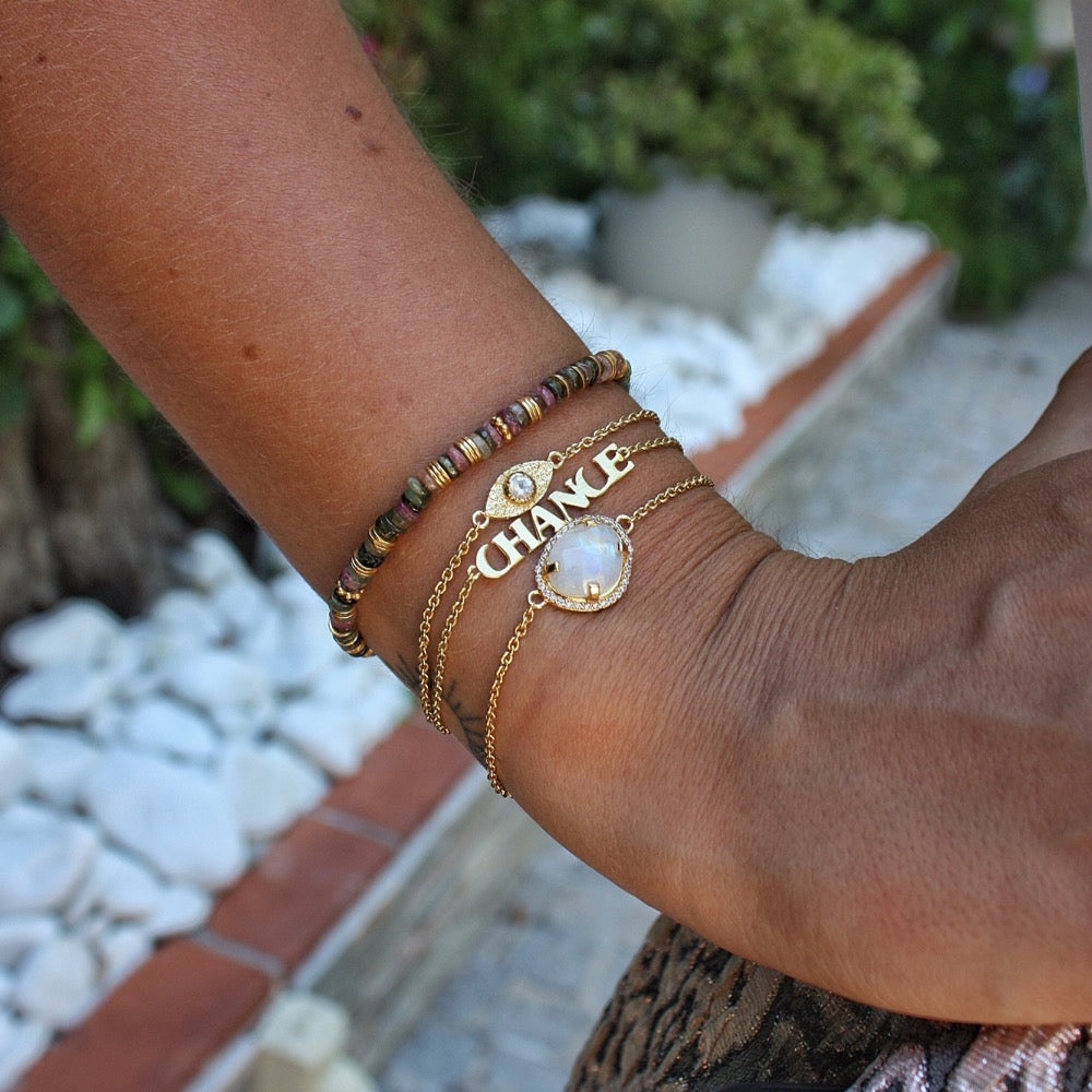 Bracelet doré pierre serti 4 griffes et zircons
