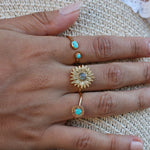 Bague dorée marguerite et pierre