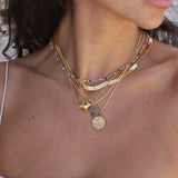 Golden necklace and multi-stone talisman
