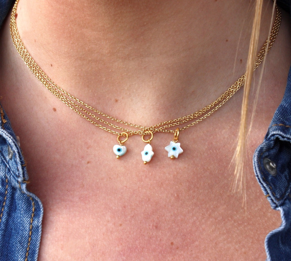 Collier doré talisman oeil nacre